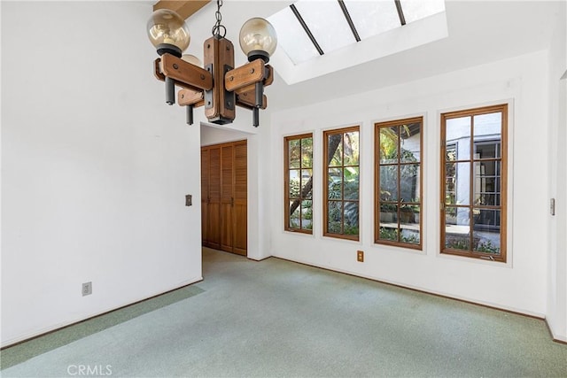 537 Avenida Buenos Aires, San Clemente, CA 92672 - empty room with a chandelier, carpet floors, healthy amount of natural light, a towering ceiling, and baseboards