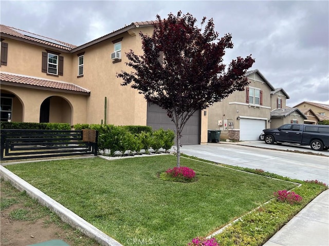 view of grassy yard featuring driveway, a garage, and cooling unit