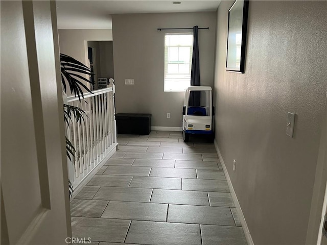 unfurnished bedroom with baseboards