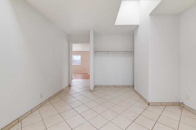 empty room featuring light tile patterned floors