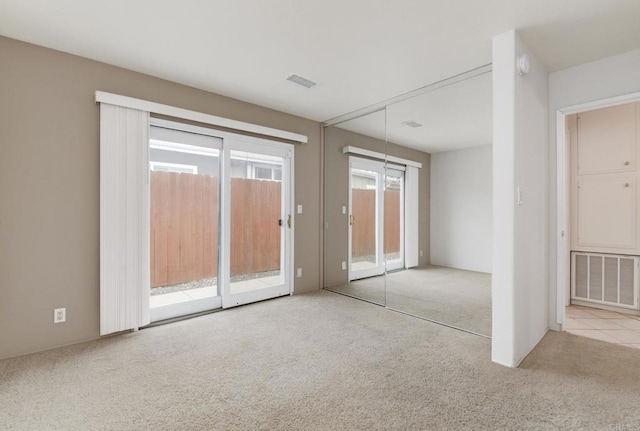 empty room with carpet floors