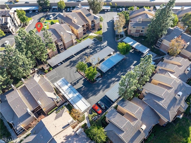 aerial view of property's location with nearby suburban area