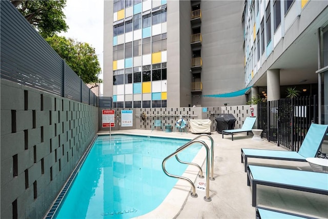 community pool with fence
