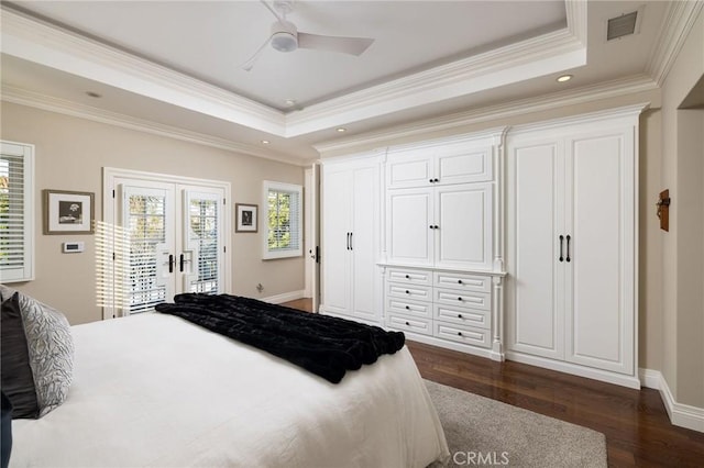 427 10th St, Huntington Beach, CA 92648 - bedroom with a tray ceiling, access to outside, dark wood finished floors, french doors, and crown molding