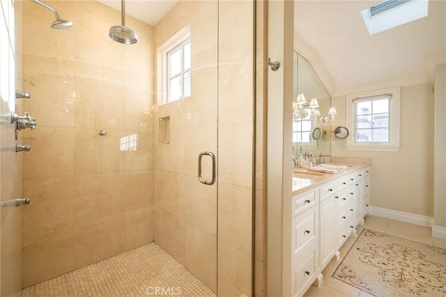 427 10th St, Huntington Beach, CA 92648 - bathroom featuring a stall shower, a skylight, tile patterned flooring, and plenty of natural light