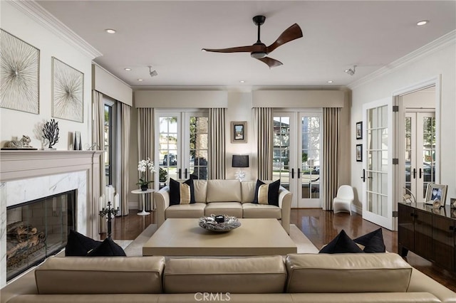 427 10th St, Huntington Beach, CA 92648 - living room with french doors, wood finished floors, a ceiling fan, baseboards, and ornamental molding