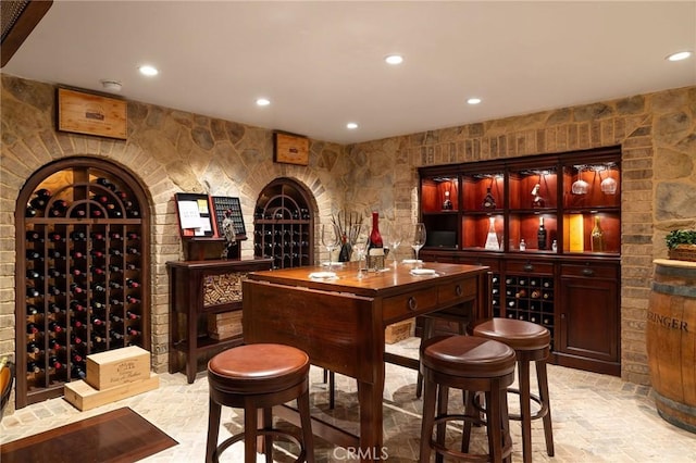 427 10th St, Huntington Beach, CA 92648 - wine area featuring recessed lighting, a dry bar, and light stone finish floors