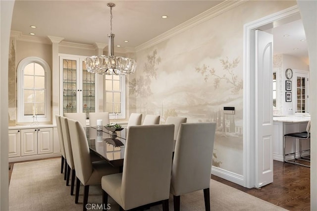 427 10th St, Huntington Beach, CA 92648 - dining area featuring a chandelier, wallpapered walls, ornamental molding, dark wood-type flooring, and recessed lighting