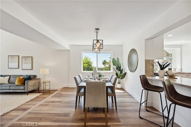 529 Manzanita Rd, Redlands, CA 92373 - dining space with wood finished floors, baseboards, and recessed lighting
