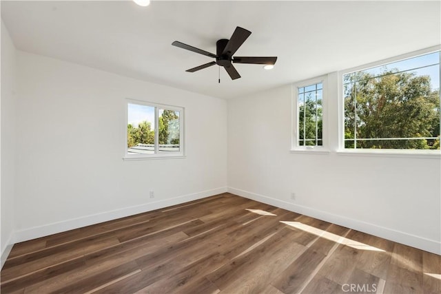 529 Manzanita Rd, Redlands, CA 92373 - spare room with plenty of natural light, baseboards, wood finished floors, and a ceiling fan