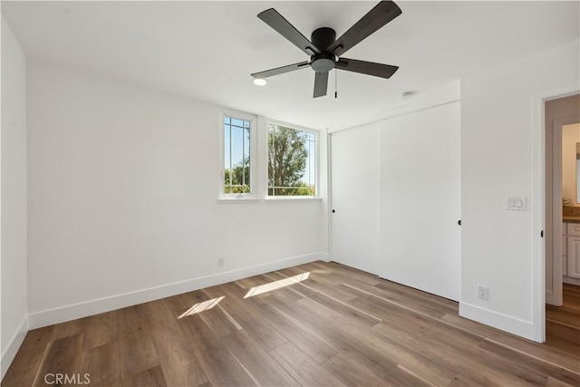 529 Manzanita Rd, Redlands, CA 92373 - unfurnished bedroom with wood finished floors, a closet, and baseboards