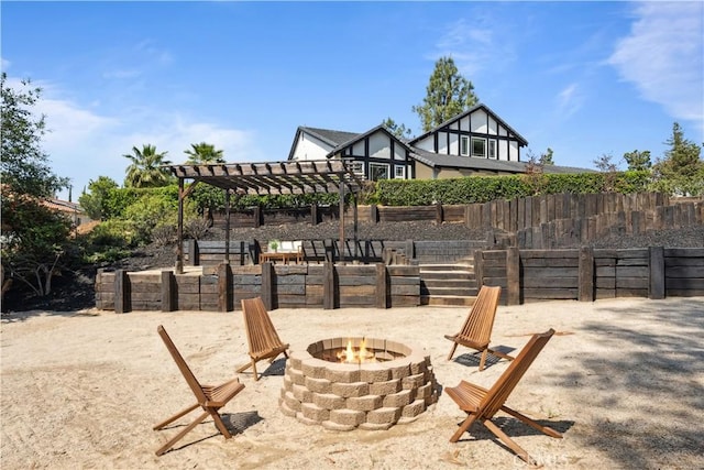 529 Manzanita Rd, Redlands, CA 92373 - view of patio with an outdoor fire pit, fence, and a pergola