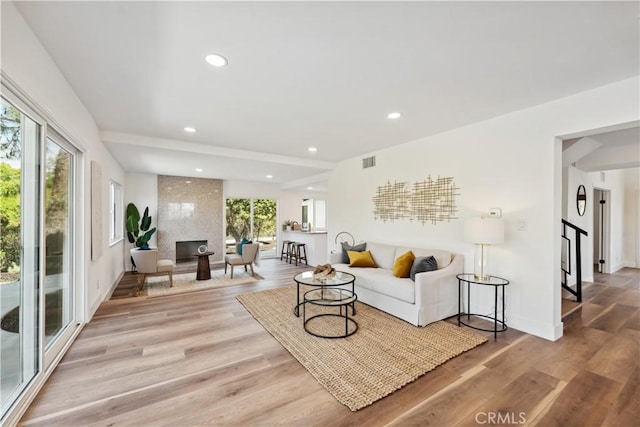 529 Manzanita Rd, Redlands, CA 92373 - living area with recessed lighting, light wood-style floors, baseboards, and stairway