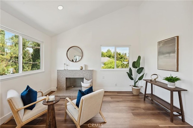 529 Manzanita Rd, Redlands, CA 92373 - living area with plenty of natural light, wood finished floors, baseboards, and high vaulted ceiling