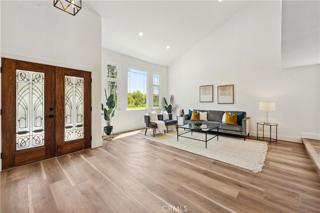 529 Manzanita Rd, Redlands, CA 92373 - foyer featuring high vaulted ceiling, baseboards, wood finished floors, french doors, and recessed lighting