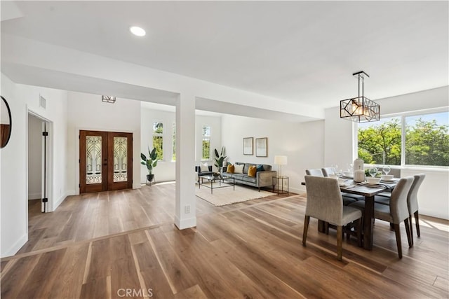 529 Manzanita Rd, Redlands, CA 92373 - dining space with wood finished floors, baseboards, recessed lighting, a chandelier, and french doors