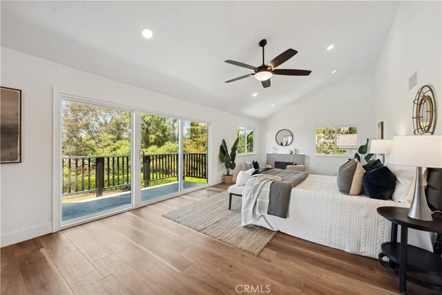 529 Manzanita Rd, Redlands, CA 92373 - bedroom with access to exterior, lofted ceiling, multiple windows, wood finished floors, and recessed lighting