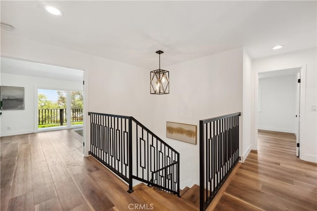 529 Manzanita Rd, Redlands, CA 92373 - stairs with wood finished floors, baseboards, and recessed lighting