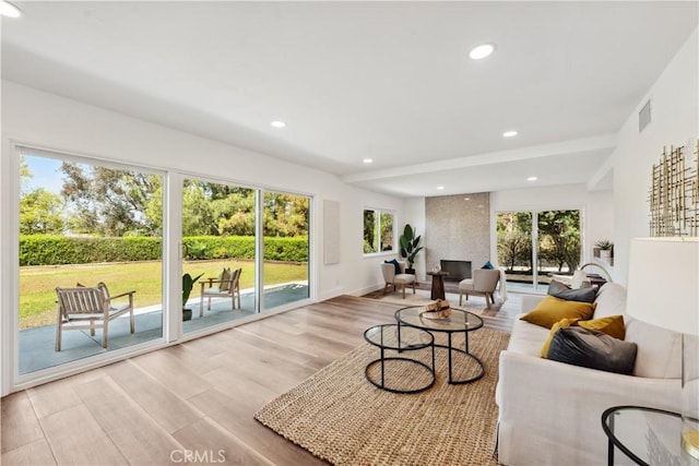 529 Manzanita Rd, Redlands, CA 92373 - living area featuring light wood-style floors, healthy amount of natural light, recessed lighting, and baseboards