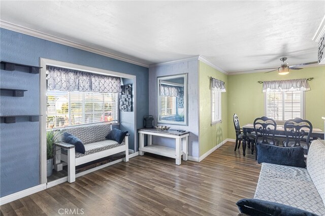 10521 Asher St, El Monte, CA 91733 - living area featuring dark wood-style floors, baseboards, ornamental molding, and a ceiling fan