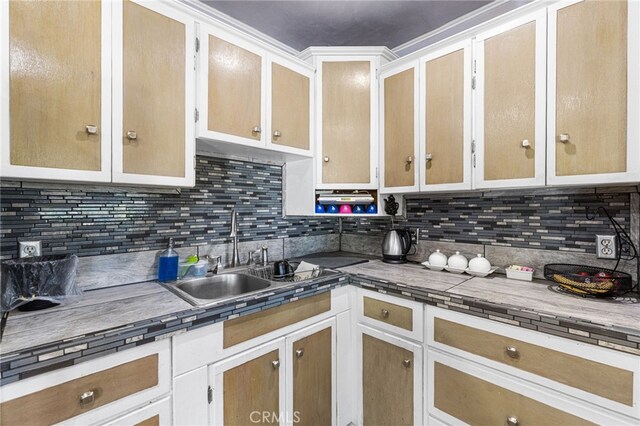 10521 Asher St, El Monte, CA 91733 - kitchen with a sink and decorative backsplash