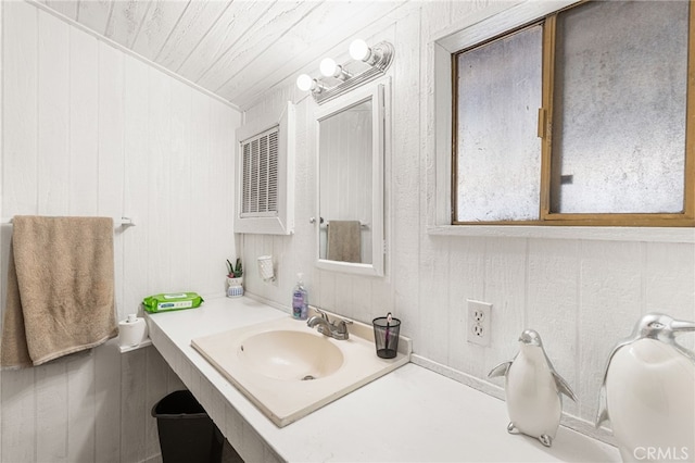 10521 Asher St, El Monte, CA 91733 - bathroom featuring wooden ceiling, vanity, and wooden walls