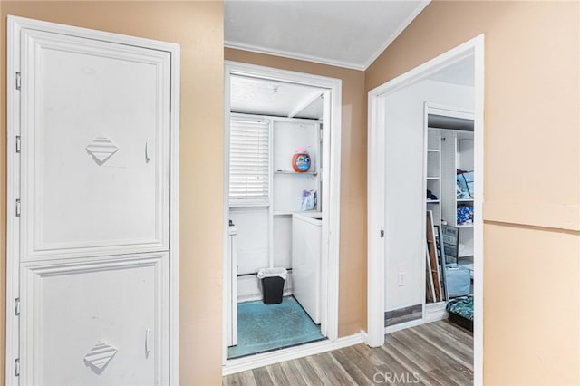 10521 Asher St, El Monte, CA 91733 - hallway with wood finished floors, ornamental molding, washer / dryer, and baseboards
