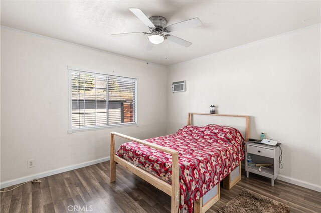 10521 Asher St, El Monte, CA 91733 - bedroom with wood finished floors, baseboards, a wall unit AC, and a ceiling fan
