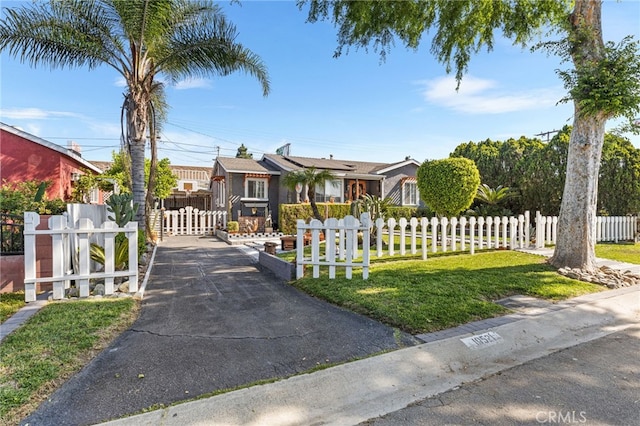 10521 Asher St, El Monte, CA 91733 - ranch-style house featuring roof mounted solar panels and a gate