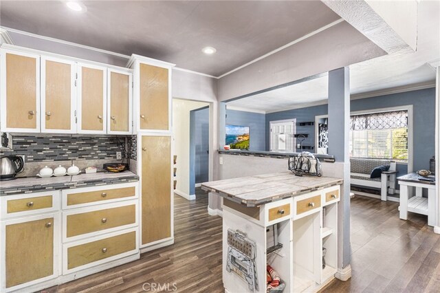 10521 Asher St, El Monte, CA 91733 - kitchen with crown molding, tasteful backsplash, recessed lighting, dark wood finished floors, and baseboards