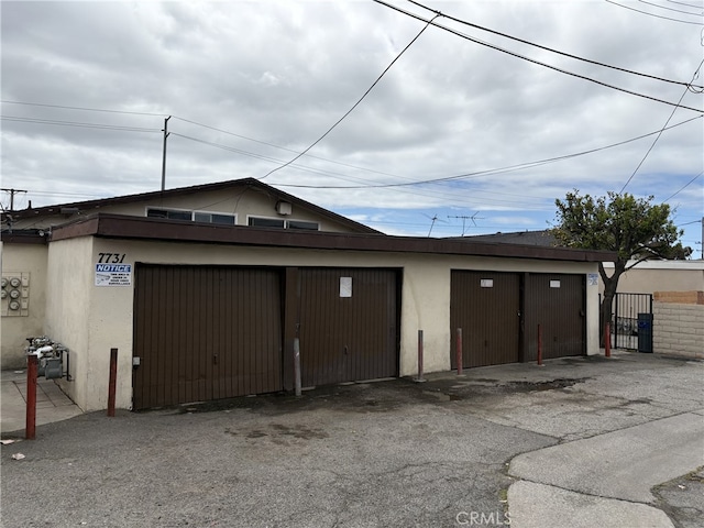7731 Slater Ave, Huntington Beach, CA 92647 - garage featuring fence