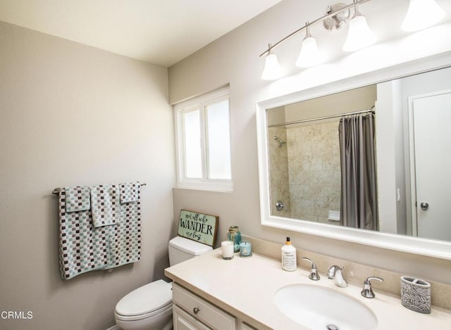 full bathroom with toilet, a shower with shower curtain, and vanity