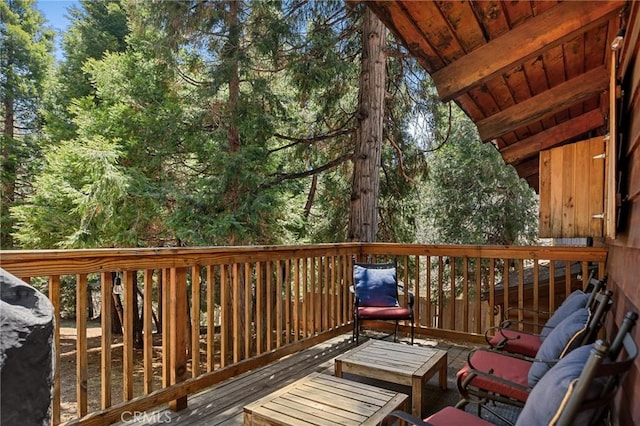 deck with an outdoor hangout area