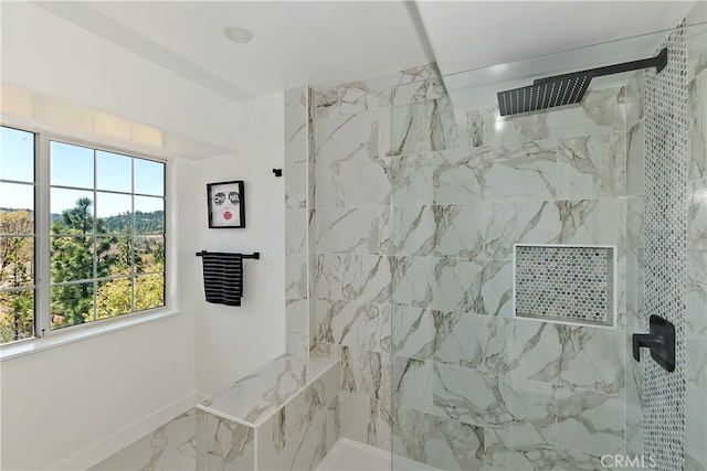 27757 N Bay Rd, Lake Arrowhead, CA 92352 - full bath with marble look tile flooring, a tile shower, and baseboards