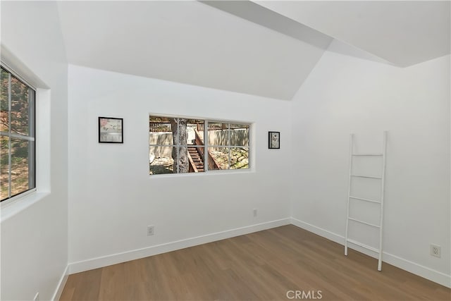 27757 N Bay Rd, Lake Arrowhead, CA 92352 - spare room with wood finished floors, lofted ceiling, and baseboards