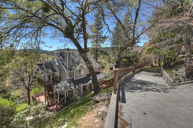 27757 N Bay Rd, Lake Arrowhead, CA 92352 - view of yard with stairs and a deck
