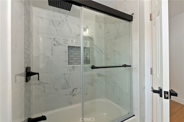 27757 N Bay Rd, Lake Arrowhead, CA 92352 - bathroom featuring bath / shower combo with glass door
