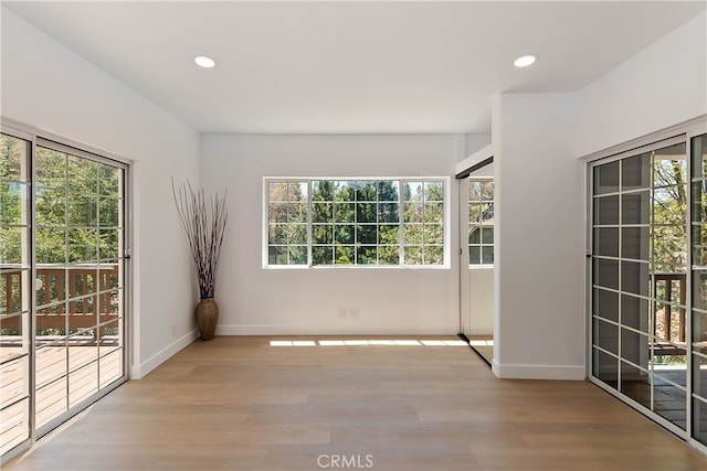27757 N Bay Rd, Lake Arrowhead, CA 92352 - unfurnished room with healthy amount of natural light, wood finished floors, baseboards, and recessed lighting