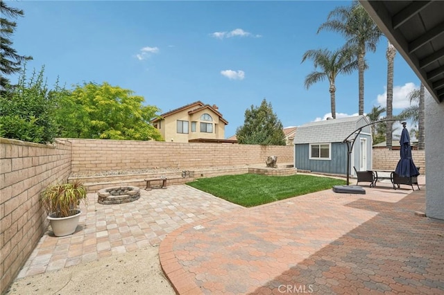 2925 Greenbriar Dr, Ontario, CA 91761 - fenced backyard featuring an outdoor fire pit and a patio area