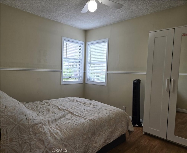 2149 Clover St, Simi Valley, CA 93065 - bedroom with wood finished floors, a textured ceiling, and a ceiling fan