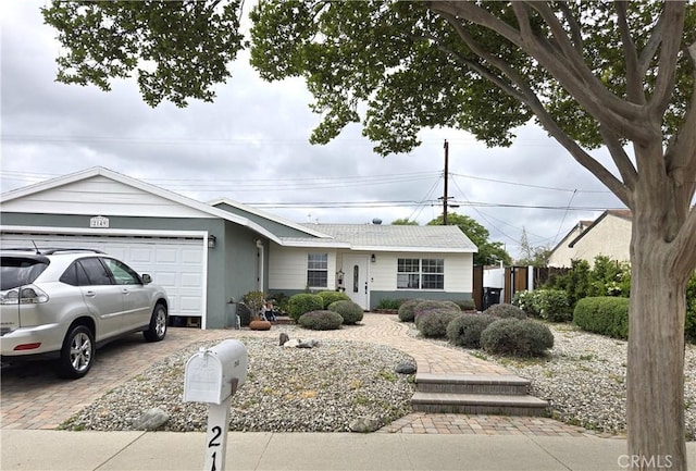 2149 Clover St, Simi Valley, CA 93065 - ranch-style house featuring an attached garage and decorative driveway