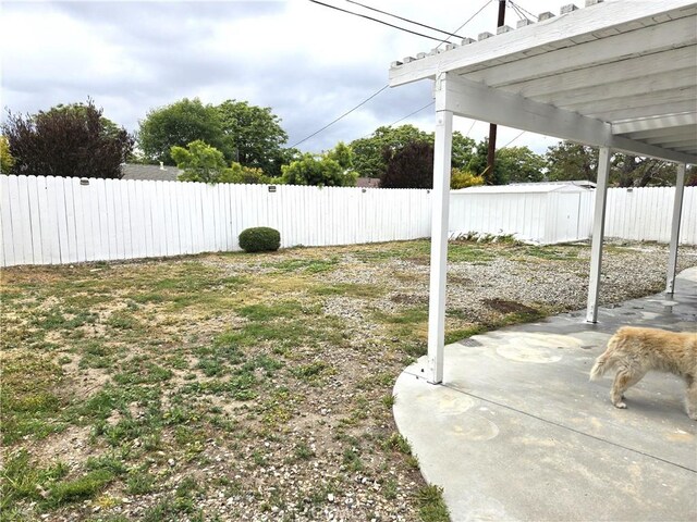 2149 Clover St, Simi Valley, CA 93065 - fenced backyard featuring a shed, a patio area, and an outdoor structure