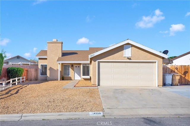 14359 Birchwood Dr, Hesperia, CA 92344 - ranch-style home featuring fence, concrete driveway, stucco siding, and an attached garage