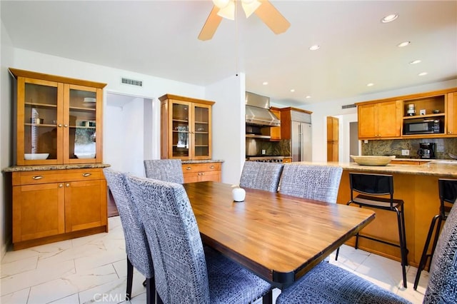 18041 Acre St, Northridge, CA 91325 - dining area featuring light marble finish flooring, ceiling fan, and recessed lighting