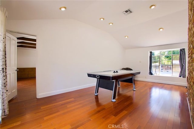 18041 Acre St, Northridge, CA 91325 - recreation room featuring vaulted ceiling, wood finished floors, baseboards, and recessed lighting