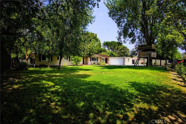 18041 Acre St, Northridge, CA 91325 - view of yard featuring an attached garage