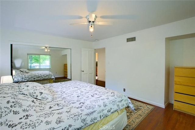 18041 Acre St, Northridge, CA 91325 - bedroom with a closet, baseboards, dark wood finished floors, and a ceiling fan