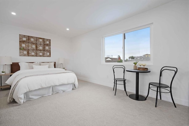 bedroom with recessed lighting, carpet floors, and baseboards