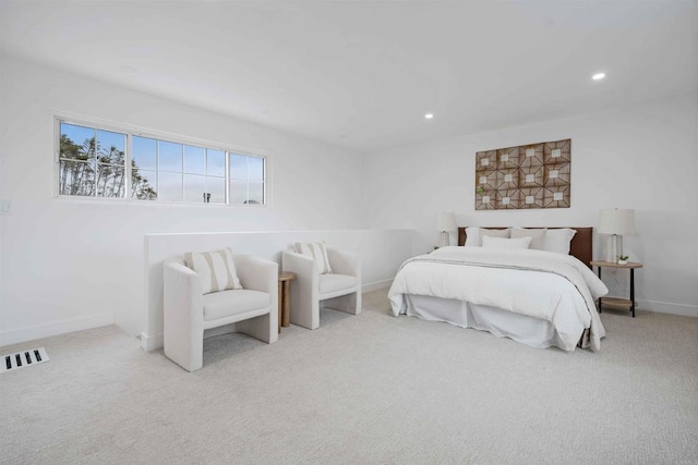 bedroom with carpet, baseboards, and recessed lighting