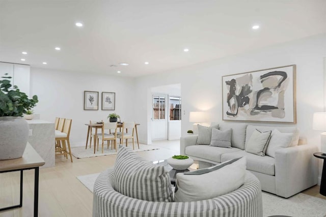 living area featuring recessed lighting